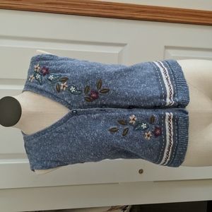 Blue sweater vest with sweet embroidered flowers. Size large